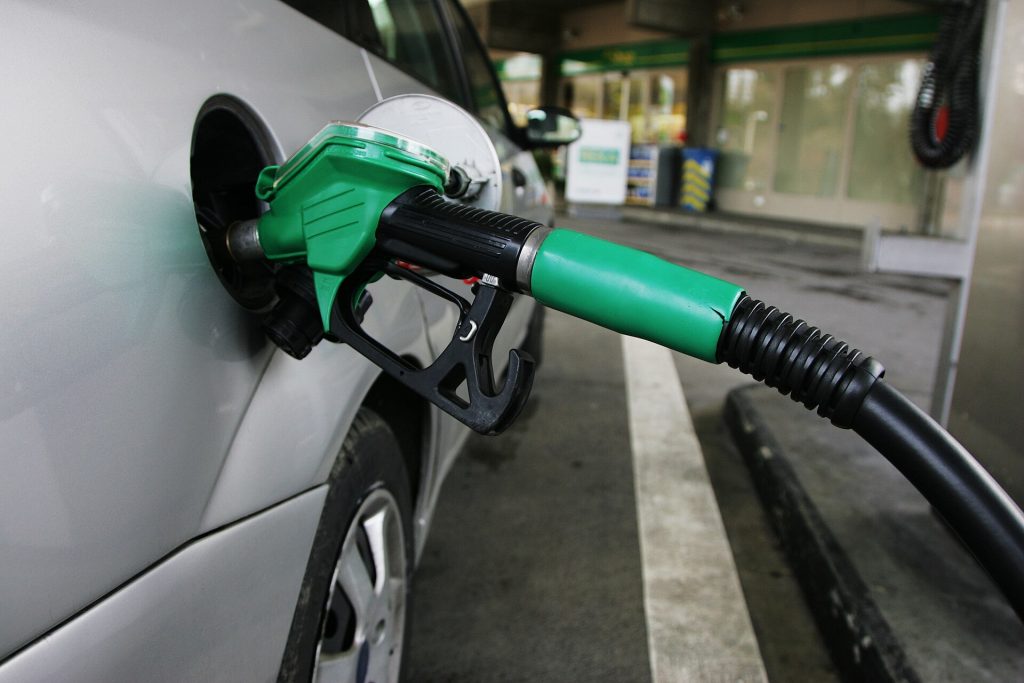 A fuel pump nozzle at a petrol station forecourt, illustrating Ghana's revised NPA fuel price floors